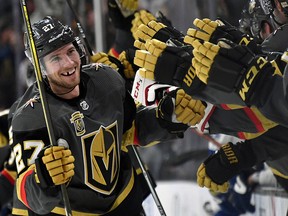 Shea Theodore of the Vegas Golden Knights celebrates with teammates after scoring to beat the Tampa Bay Lightning at T-Mobile Arena on December 19, 2017 in Las Vegas. (Ethan Miller/Getty Images)