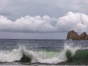 A general view shows waves crashing on the shore of La Empacadora beach in Cabo San Lucas as Hurricane Lorena churns close to the southern tip of Mexico's Baja California peninsula on Friday afternoon, September 20, 2019.