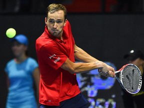 Russia's Daniil Medvedev hits a return to Croatia's Borna Coric during their St. Petersburg Open tennis tournament final match in Saint Petersburg on Sept. 22, 2019.