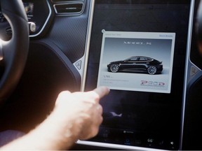 The Tesla Model S version 7.0 software update containing Autopilot features is demonstrated during a Tesla event in Palo Alto, California, U.S., October 14, 2015.
