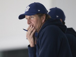 Head coach Mike Babcock watches his players as the Toronto Maple Leafs skate at the Ford Performance Centre Tuesday September 10, 2019. Stan Behal/Toronto Sun