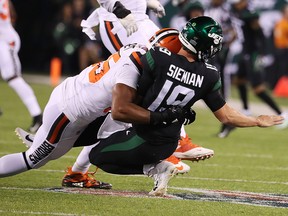 Trevor Siemian of the New York Jets is hurt on this play after he is tackled by Myles Garrett of the Cleveland Browns during their game at MetLife Stadium on September 16, 2019 in East Rutherford, N.J. (Al Bello/Getty Images)