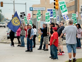 Members of the United Auto Workers (UAW) who are employed at the General Motors Flint Assembly plant in Flint, Michigan, picket outside of the plant as they strike on September 16, 2019. (JEFF KOWALSKY/AFP/Getty Images)