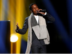 A$AP Rocky performs "I'm Not the Only One" with Sam Smith (not pictured) during the 42nd American Music Awards in Los Angeles, California November 23, 2014.