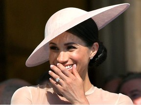 Meghan, Duchess of Sussex attends a garden party at Buckingham Palace, in London, Britain May 22, 2018.