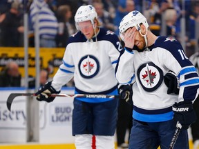 ST. LOUIS, MO - APRIL 20: Bryan Little #18 of the Winnipeg Jets reacts after the Jets were eliminated in Game Six of the Western Conference First Round during the 2019 NHL Stanley Cup Playoffs at the Enterprise Center on April 20, 2019 in St. Louis, Missouri.