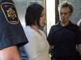 Terri-Lynne McClintic, convicted in the death of eight-year-old Woodstock, Ont., girl Victoria Stafford, is escorted into court in Kitchener, Ont., on Wednesday, September 12, 2012 for her trial in an assault on another inmate while in prison.
