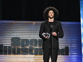 Colin Kaepernick receives the SI Muhammad Ali Legacy Award during Sports Illustrated 2017 Sportsperson of the Year Show. (GETTY IMAGES)