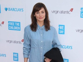 Natalie Imbruglia poses for photographers on arrival at We Day UK at Wembley Arena, in London, on March 5, 2015.