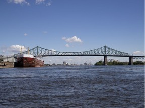 The Jacques-Cartier Bridge is seen from water level June 17, 2019.