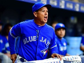 Manager Charlie Montoyo of the Toronto Blue Jays gets in an argument with umpire Bill Miller before getting thrown out during the third inning of a baseball game against the Tampa Bay Rays at Tropicana Field on September 06, 2019 in St Petersburg, Florida.