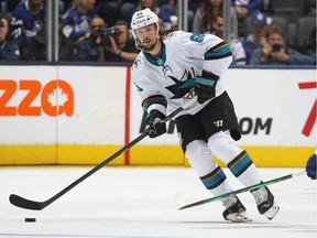 Erik Karlsson #65 of the San Jose Sharks looks to make a pass against the Toronto Maple Leafs during an NHL game at Scotiabank Arena on October 25, 2019 in Toronto, The Maple Leafs defeated the Sharks 4-1.