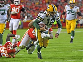 Quarterback Aaron Rodgers #12 of the Green Bay Packers gets tackled short of the goal line against the Kansas City Chiefs during the second half at Arrowhead Stadium on October 27, 2019 in Kansas City, Missouri. (Photo by Peter Aiken/Getty Images)