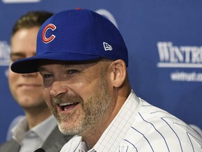 David Ross, new manager of the Chicago Cubs, talks to the media during a press conference at Wrigley Field on October 28, 2019 in Chicago, Illinois.