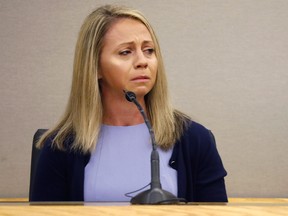 In this Friday, Sept. 27, 2019, file pool photo, fired Dallas police officer Amber Guyger becomes emotional as she testifies in her murder trial in Dallas. (Tom Fox/The Dallas Morning News via AP, Pool, File)