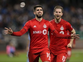 Toronto FC's Alejandro Pozuelo celebrates after scoring the game-winning goal against New York City FC on Wednesday. (USA TODAY SPORTS)