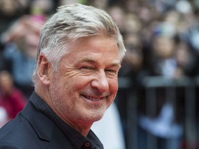 Alec Baldwin walks the red carpet for the movie "The Public" at Roy Thompson Hall during the Toronto International Film Festival in Toronto on Sept. 9, 2018.