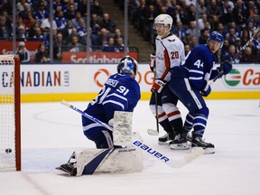 A shot by Washington Capitals forward Alex Ovechkin (not pictured) scores against Toronto Maple Leafs goaltender Frederik Andersen (31) as Washington forward Lars Eller (20) and Toronto defenceman Morgan Rielly (44) look on at Scotiabank Arena. Mandatory Credit: John E. Sokolowski-USA TODAY