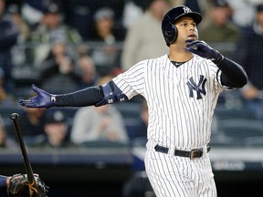 New York Yankees centre fielder Aaron Hicks drops his bat as he watches his three run home run against the Houston Astros during Game 5 of the ALCS at Yankee Stadium. (Brad Penner-USA TODAY Sports)