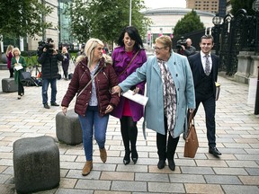 Sarah Ewart (left) alongside her mother Jane Christie (right) and Grainne Teggart (middle) of Amnesty International leave Belfast High Court after the landmark ruling in their favour which found that Northern Irelands strict abortion laws breached UK human rights on October 3, 2019 in Belfast, Northern Ireland.  (Charles McQuillan/Getty Images)