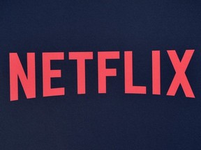 In this file photo taken on June 28, 2019 Netflix logo is seen on the backdrop of Netflix's "Stranger Things 3" premiere at Santa Monica high school Barnum Hall in Santa Monica, California.
