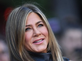 In this file photo taken on June 10, 2019 US actress Jennifer Aniston arrives to attend the Los Angeles premiere screening of the Netflix film "Murder Mystery" at the Regency Village Theatre in Los Angeles.