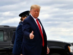 US President Donald Trump arrives to board Air Force One at Joint Base Andrews in Maryland as he departs for a campaign rally in Dallas, Texas, on October 17, 2019. (Photo by Nicholas Kamm / AFP)