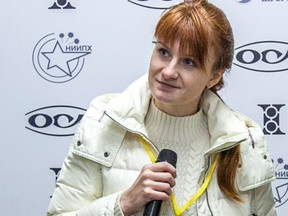 In this file photo taken on Oct. 8, 2013, Maria Butina, leader of a pro-gun organization, speaks during a press conference in Moscow. (STR/AFP via Getty Images)