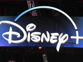 In this file photo taken on August 23, 2019 a Disney+ streaming service sign is pictured at the D23 Expo, billed as the "largest Disney fan event in the world," at the Anaheim Convention Center in Anaheim, Calif. (ROBYN BECK/AFP via Getty Images)