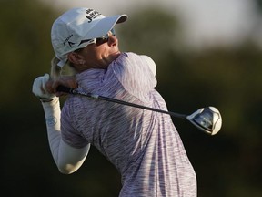 Alena Sharp watches her tee shot on the 18th hole during the second round of the Volunteers of America Classic at the Old American Golf Club in The Colony, Texas, on Friday, Oct. 4, 2019.