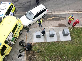 Police officers apprehend an armed man who stole an ambulance in Oslo, Norway, October 22, 2019. (Cathrine Hellesoy/Aftenposten/NTB Scanpix via REUTERS)