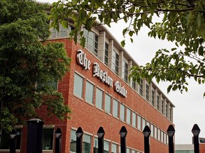The Boston Globe's logo is seen on the newspaper's building in Boston, Massachusetts June 15, 2009. (REUTERS/Brian Snyder/File Photo)