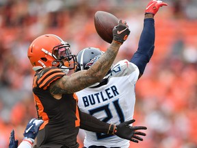 Odell Beckham Jr. of the Cleveland Browns attempts to catch a pass in behind Malcolm Butler of the Tennessee Titans at FirstEnergy Stadium on September 8, 2019 in Cleveland.  (Jamie Sabau/Getty Images)
