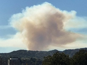 Smoke can be seen as a wild fire breaks out in the hills of Pacific Palisades in Los Angeles October 21, 2019. (REUTERS/Gene Blevins)