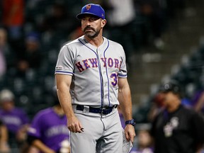 New York Mets manager Mickey Callaway (36) watches during a game against the Colorado Rockies at Coors Field. (Isaiah J. Downing-USA TODAY Sports)