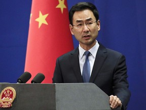 In this file photo dated Tuesday, Jan. 29, 2019, Chinese Foreign Ministry spokesman Geng Shuang speaks during a daily briefing at the Ministry of Foreign Affairs office in Beijing. (AP Photo/Andy Wong, FILE)
