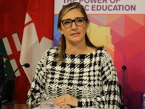 Lauren Walton, president of CUPE's Ontario School Board Council of Unions, announces Wednesday, Oct. 2, 2019 that 55,000 education workers will be in a strike position on Oct. 7.