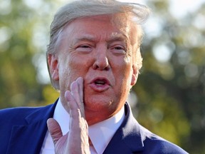 U.S. President Donald Trump speaks to the press after announcing and initial deal with China on the South Lawn of the White House in Washington, D.C., on Oct. 11, 2019.