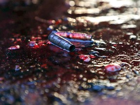 Ammunition shells lay on a pool of blood in a street of Culiacan, capital of jailed kingpin Joaquin "El Chapo" Guzman's home state of Sinaloa, on October 17, 2019. (RASHIDE FRIAS/AFP via Getty Images)