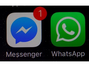 WhatsApp and Facebook messenger icons are seen on an iPhone in Manchester , Britain March 27, 2017.