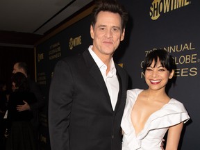 Jim Carrey and Ginger Gonzaga attend the Showtime Golden Globe Nominees Celebration at Sunset Tower Hotel on Jan. 5, 2019 in West Hollywood, Calif.  (Earl Gibson III/Getty Images)