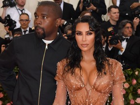 Kim Kardashian and Kanye West arrive for the 2019 Met Gala at the Metropolitan Museum of Art on May 6, 2019, in New York. (ANGELA WEISS/AFP/Getty Images)