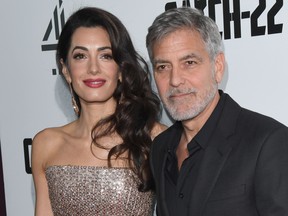 Amal Clooney and George Clooney attend the "Catch 22" U.K. premiere on May 15, 2019 in London. (Stuart C. Wilson/Getty Images)