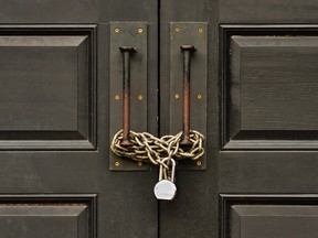 padlocked wooden door