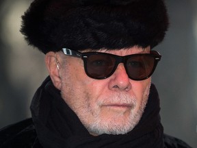In this Feb. 5, 2015, file photo, British former pop star Gary Glitter, whose real name is Paul Gadd, arrives at Southwark Crown Court in central London.