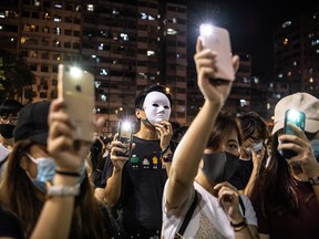 People protest a ban against masks in Sham Shui Po on October 5, 2019 in Hong Kong, China. (Laurel Chor/Getty Images)