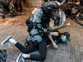 Pro-democracy protesters arrested by police during a clash at a demonstration in Wan Chai district on October 6, 2019 in Hong Kong, China. (Anthony Kwan/Getty Images)
