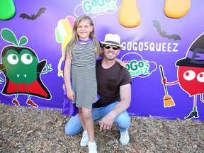 Mia Loren Ziering (left) and Ian Ziering attend the GoGo squeeZ GoGoWeen Halloween Launch Event in Los Angeles on Oct. 7, 2019.