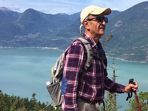 This handout photograph released on Feb. 11, 2018 by the family of Iranian-Canadian environmentalist Kavous Seyed Emami shows him hiking. (HANDOUT/AFP/Getty Images)