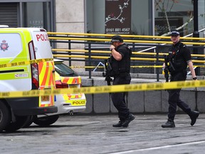 Armed police surround Arndale shopping centre, where a man allegedly stabbed five people on October 11, 2019 in Manchester, England. (Anthony Devlin/Getty Images)